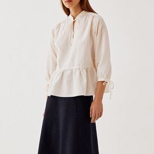JW Anderson x Uniqlo ruffled linen cream top